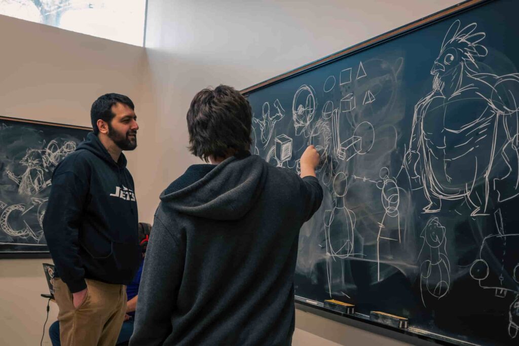 Image of Jonathan Drawing During Hackathon